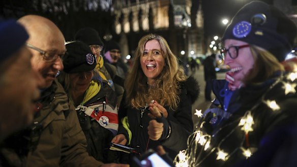 Anti-Brexit demonstrators react to the vote in Westminster.