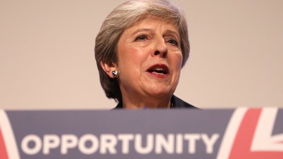 Theresa May delivers her keynote speech during the Conservative Party annual conference in Birmingham.
