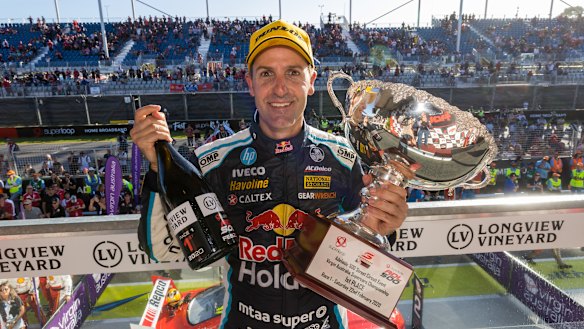 Jamie Whincup celebrates his success in the Superloop Adelaide 500.
