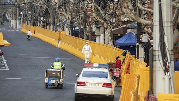Shanghai has thrown up walls to divide locked-down neighbourhoods  from the ones that are still open.