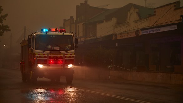 An RFS truck travels through Bundanoon as rain begins to fall in January.