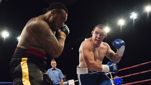 Junior Pallen in the ring with Paul Gallen in 2016.