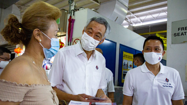 Singaporean Prime Minister Lee Hsien Loong on the hustings ahead of Friday's election. There are signs he may hang on for longer than announced.