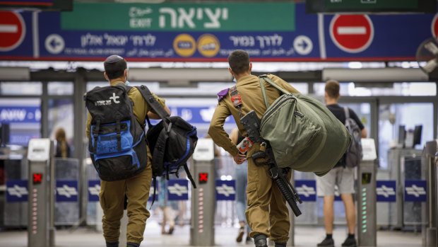 Prospects for violence: Israeli soldiers at  Hashalom train station in Tel Aviv.