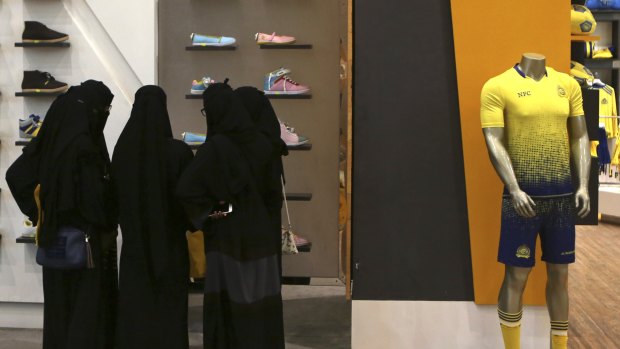 Saudi women shop at a mall in Riyadh.