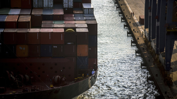 Maritime workers wait to dock at a Brazilian port.