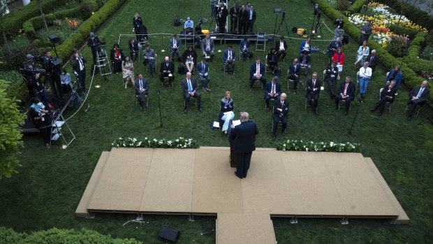 US President Donald Trump speaks during a news conference in the Rose Garden of the White House in Washington DC.