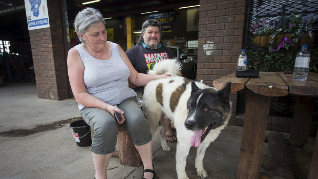 Maryanne and Sam Pernice at Little River General Store. Mr Pernice fled their Narraburra Road farm with their dog Brutus as the fire approached.