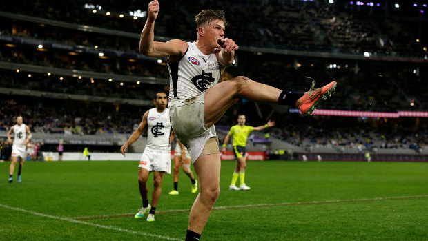 Last gasp: Jack Newnes takes his kick after the siren to seal the win over Fremantle.