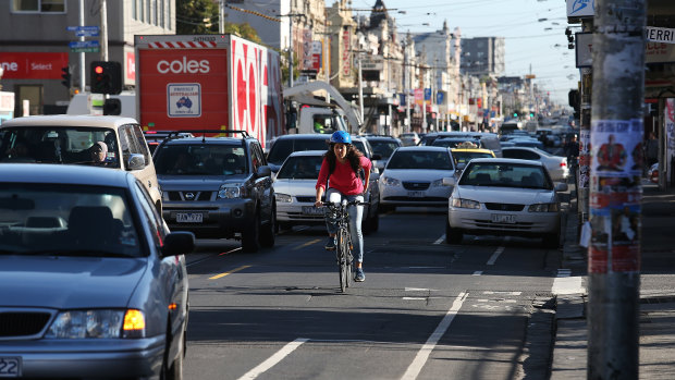 Cyclists take their chances on Sydney Road.