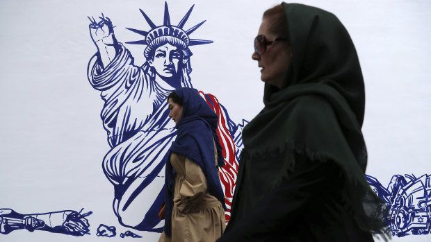 A cartoon of the Statue of Liberty forms part of anti-US murals painted on the wall of the former American embassy in Tehran to commemorate the 40th anniversary of the takeover.