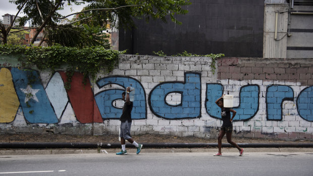 Caracas began going dry on Monday as Venezuela's power crisis put utilities out of commission, risking supplies for 5.5 million people.