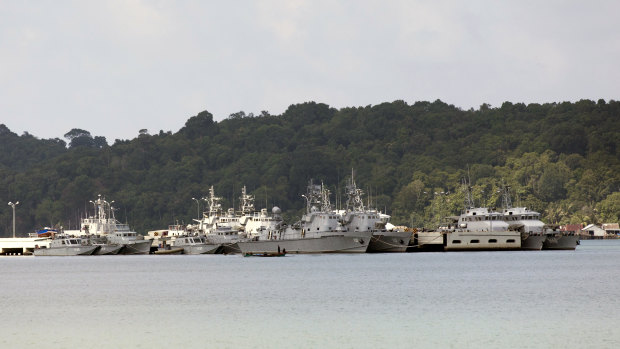 Ships and boats sit moored at the Ream Naval Base near Sihanoukville, Cambodia.