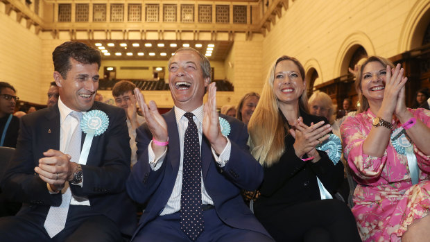 Nigel Farage, leader of the Brexit Party, celebrates the party's success. The two largest centrist groups in the current European Parliament lost their combined majority.