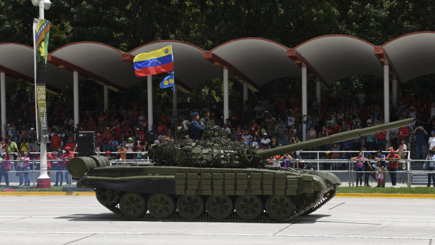 A tank drives past during a Venezuela Independence Day military parade in Caracas.