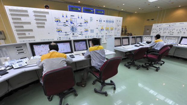 Iranian technicians work at the Bushehr nuclear power plant in this 2010 image released by Iran. 