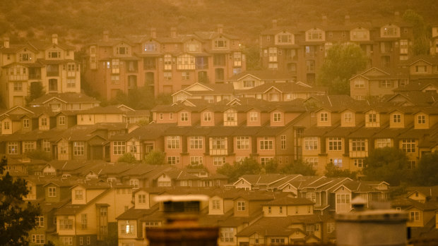 Smoke fills the air over homes in Oakland, California.