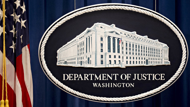 The Department of Justice seal.