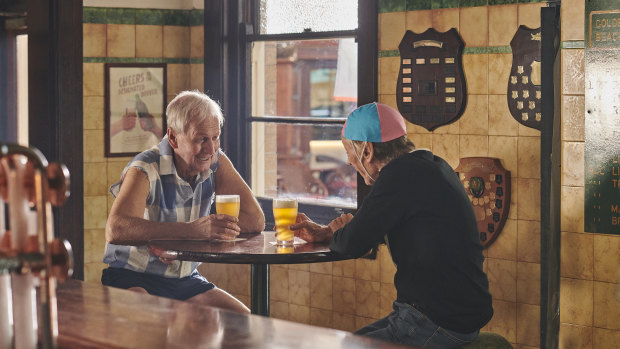 Paul Hogan and John "Strop" Cornell in the new ad.