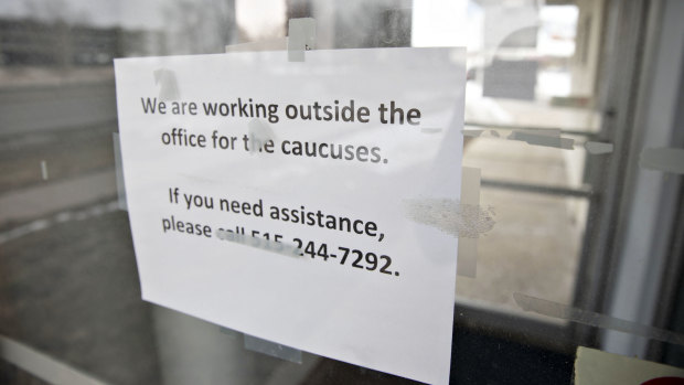A sign is displayed on the front door of the Iowa Democratic Party headquarters in Des Moines, Iowa, US.