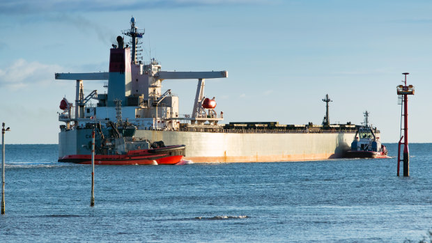Two crew aboard a bulk carrier anchored of Port Hedland have tested positive to COVID-19.