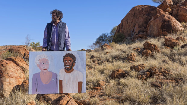 Vincent Namatjira with his work The Queen and Me.
