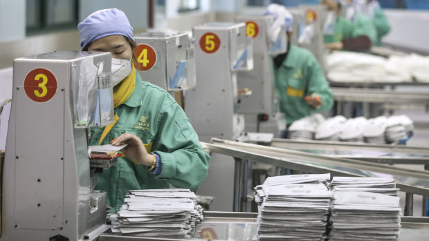Face mask production at a factory in Shanghai. The pandemic has exposed the world's reliance on China for critical medical products and technology.