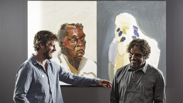 Quilty and Vincent Namatjira in front of Quilty's 2004 work <i>Albert</i>. 