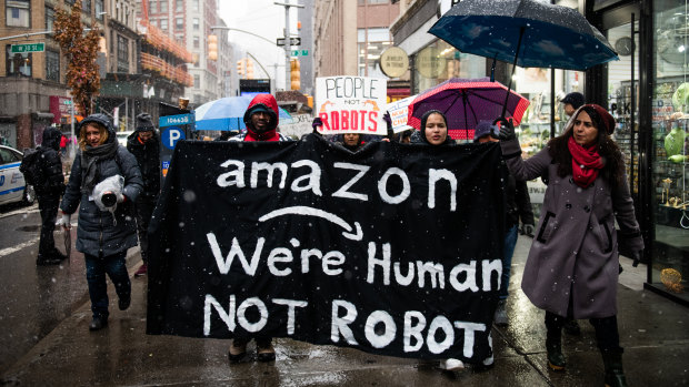 Amazon workers protested outside Jeff Bezos's NYC penthouse.