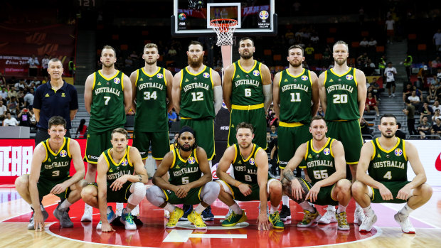 High hopes: The Australian squad, with coach Andrej Lemanis, pose before the opening game of the 2019 FIBA World Cup.