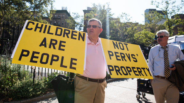 Robert Hoatson, a former New Jersey priest and president of Road to Recovery, protests outside the New York court hearing the Epstein case on Monday.