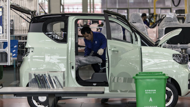 An assembly line for mini electric cars in Liuzhou. China’s electric vehicle production and sales both more than doubled in July.