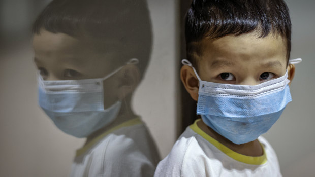 A child at Manila's international airport: Public fears over coronavirus is growing.