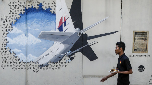 A mural for the missing MH370 in Kuala Lumpur.