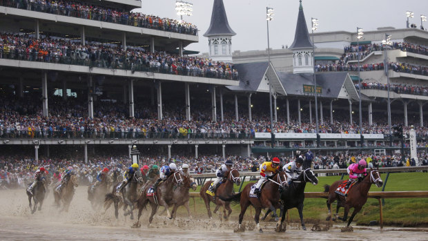 Maximum Security (far right) leads the Kentucky Derby before later becoming the first winner ever to be disqualified in the marquee race.