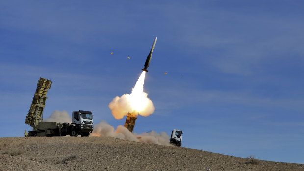 File photo: A Sayyad 2 missile is fired by the Talash air defense system during drills in an undisclosed location in Iran in November. 