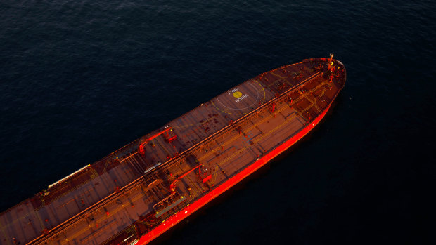 Oil tankers are seen anchored in the Pacific Ocean carrying crude oil no one will buy.