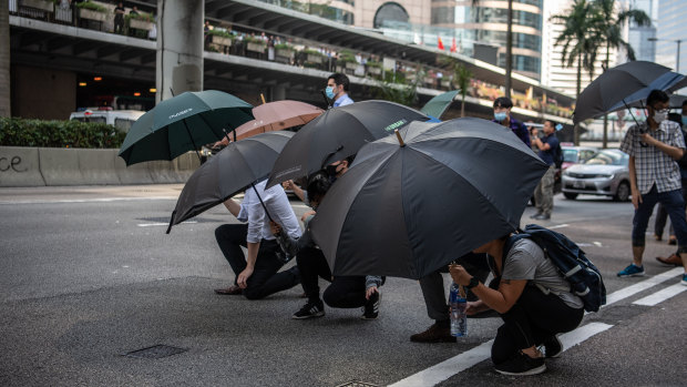 Demonstrators occupy Connaught Road Central during a protest in the Central district of Hong Kong.