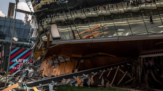 Fallen sections of the Artz Pedregal shopping mall lie on the ground in Mexico City.