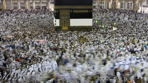 Muslim pilgrims pass around the Kaaba, at the Grand Mosque, ahead of the Hajj pilgrimage in the Muslim holy city of Mecca, Saudi Arabia. Saudi Arabia halted travel to the holiest sites in Islam over fears of the global outbreak of the new coronavirus.