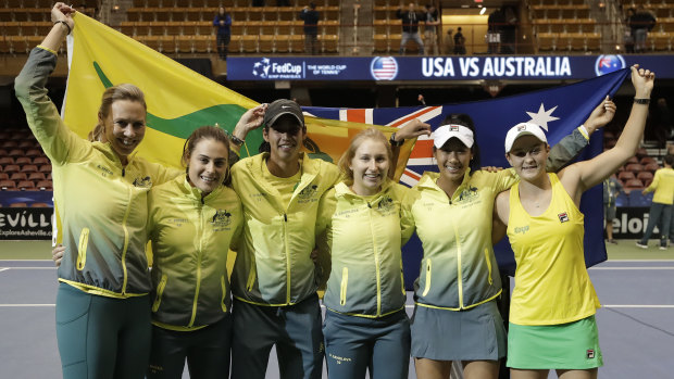 Australia enjoy their triumph over the US in the Fed Cup.
