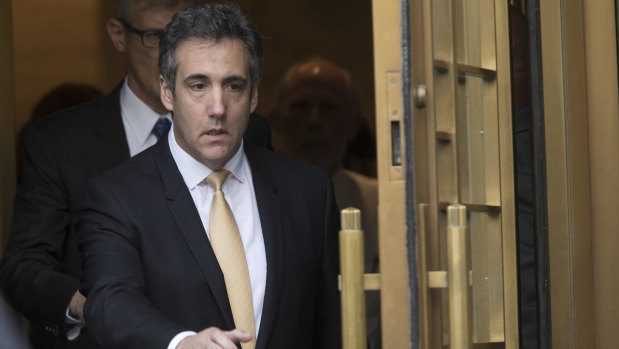 Michael Cohen leaves a federal court in New York after pleading guilty to financial crimes.