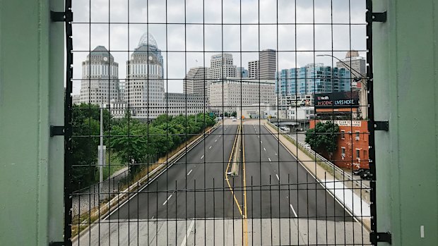 An empty highway is seen from an overpass bridge in Cincinnati, Ohio, where 70 per cent of revenue comes from taxes on wages.