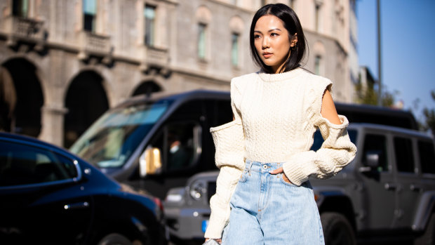 Cable knits on the streets of Paris during fashion week, before the pandemic.