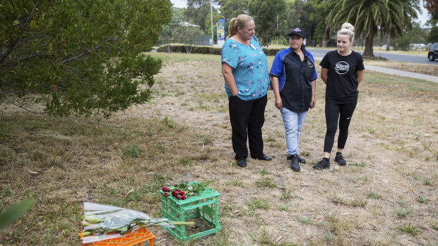 Kylie Fitzgerald, Clair Cursio and Becky Blenner who work at the shopping centre laid flowers at the scene.