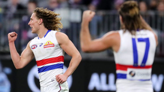 Bulldogs spearhead Aaron Naughton celebrates a goal against the Dockers at Optus Stadium.