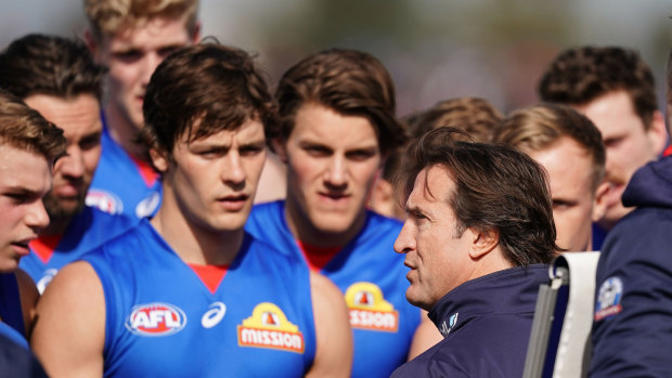 Dogs have their day: Luke Beveridge with his players during quarter time break in the round 23 win over Adelaide that sealed their spot in finals.