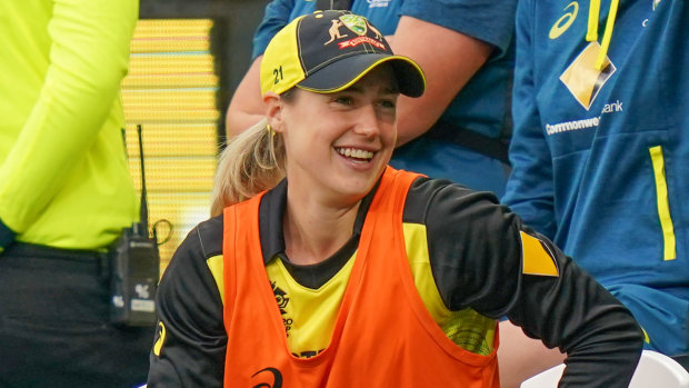 Support role: Injured Australian allrounder Ellyse Perry watched on as her side dominated.