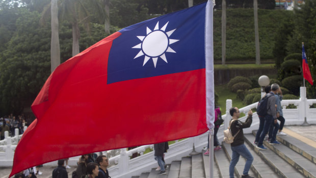 A Taiwan flag stands at the National Palace Museum in Taipei, Taiwan.