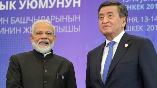 Indian Prime Minister Narendra Modi and Kyrgyzstan's President Sooronbai Jeenbekov in Shanghai in June.